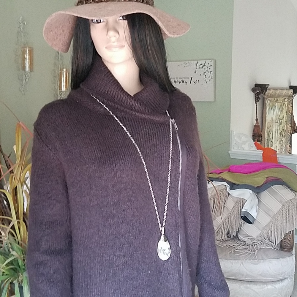 Sweater with a zipper on the side.